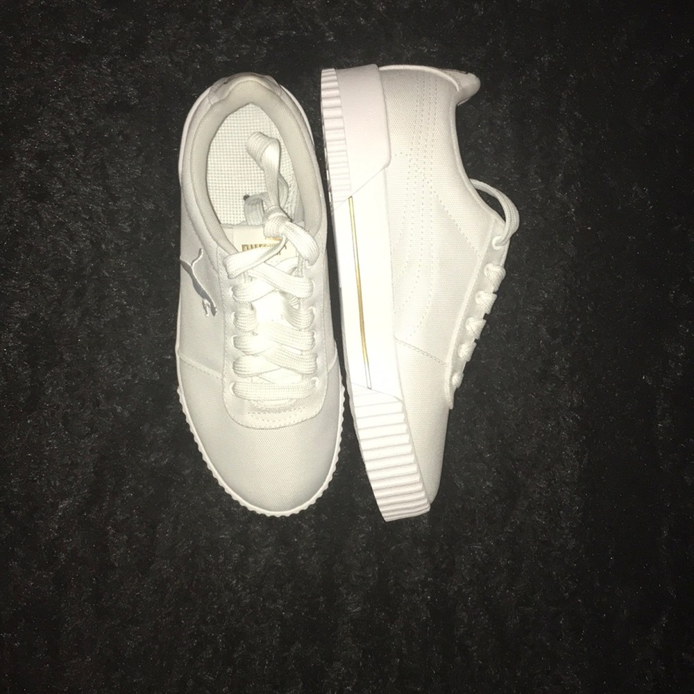 White and gold pumas